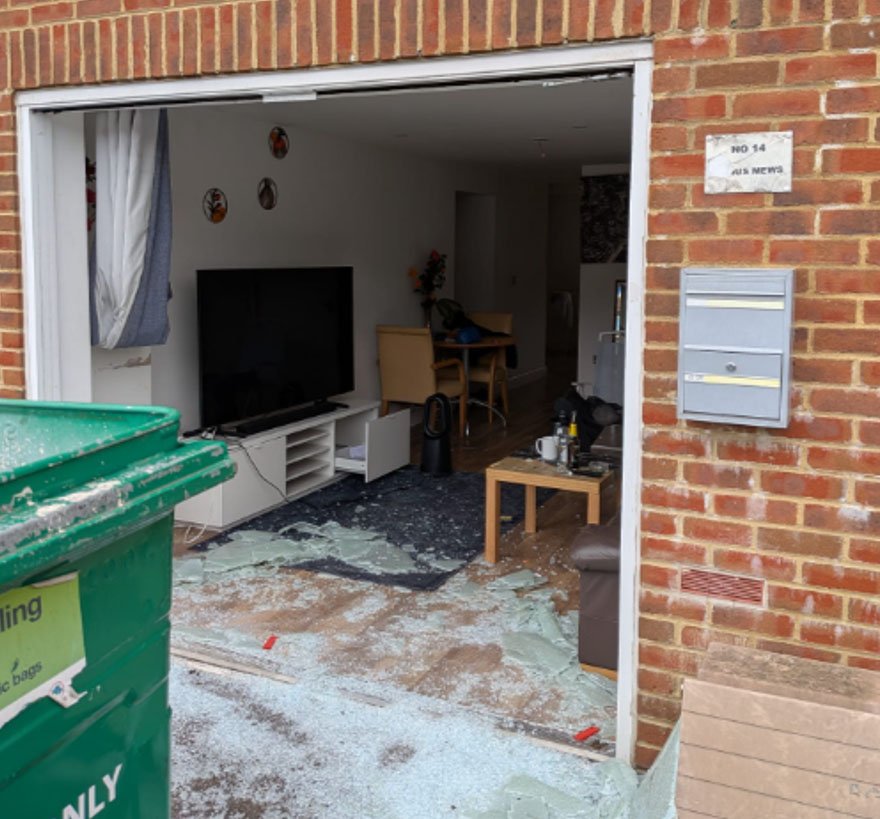 Photograph showing boarding of occupied residential property — unlawful eviction evidence filed in proceedings